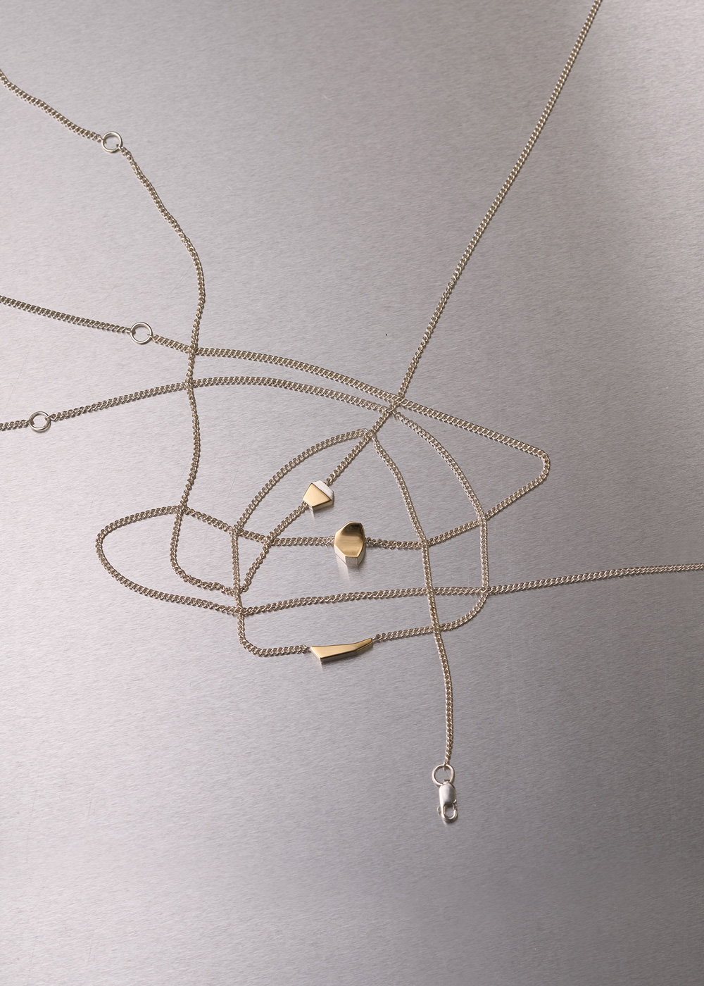 kunokunui-jewelry-pendant-silver-gold